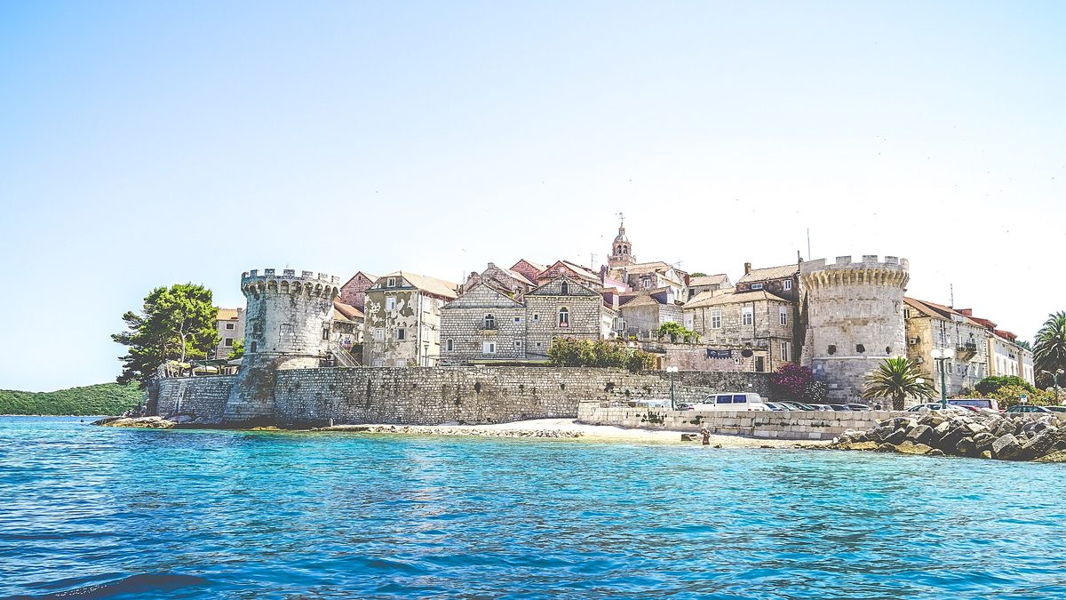 Korcula old town and walls seen from the sea, Croatia