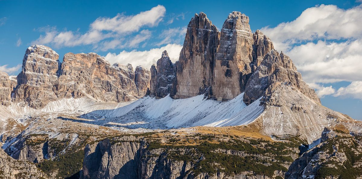Hikers below Tre Cime di Lavaredo, one of the best hikes in Europe