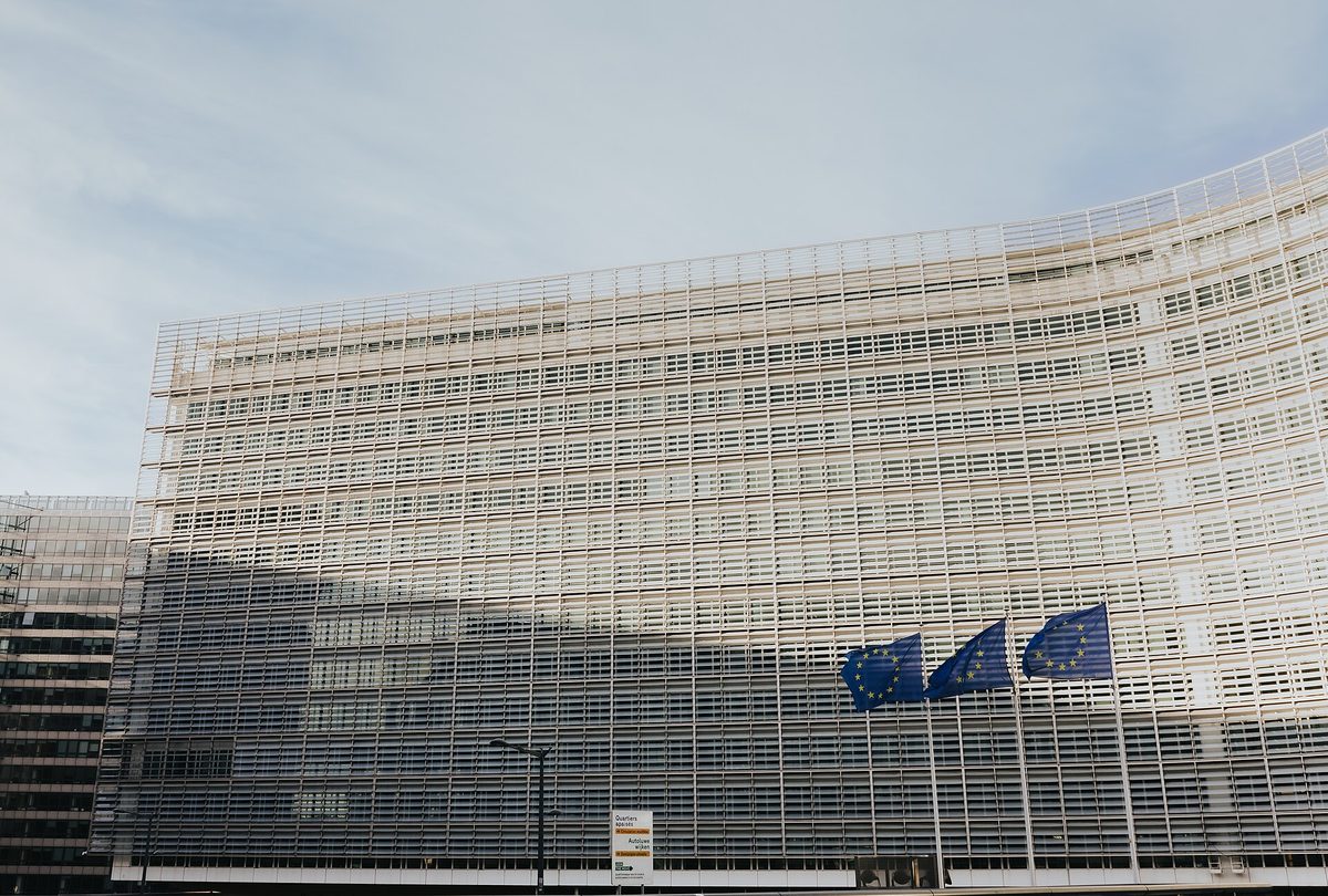 EU flags outside the European Commission in Brussels — the institution behind ETIAS, Europe's new travel authorisation