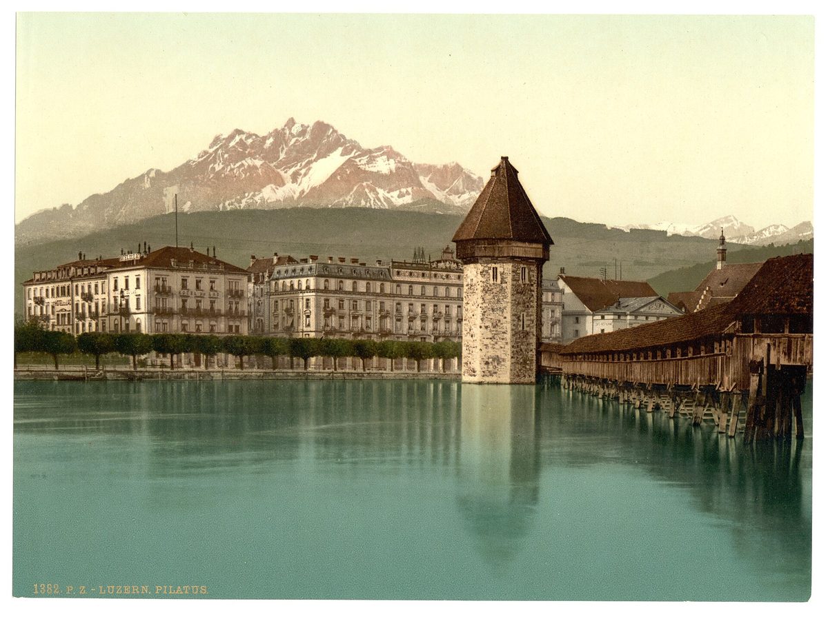 The wooden Chapel Bridge and octagonal Water Tower in Lucerne, Switzerland