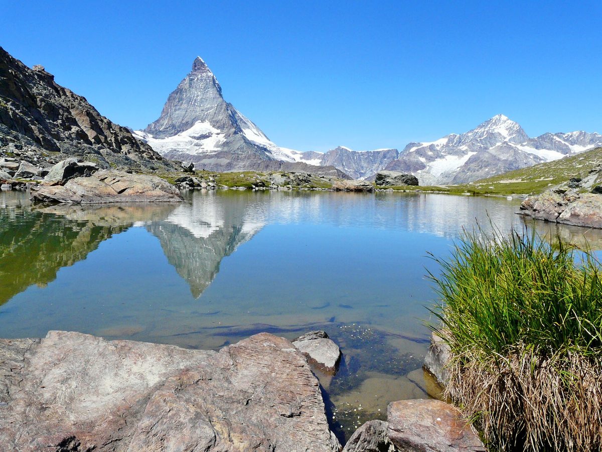 The Matterhorn reflected in the Riffelsee lake above Zermatt, Switzerland