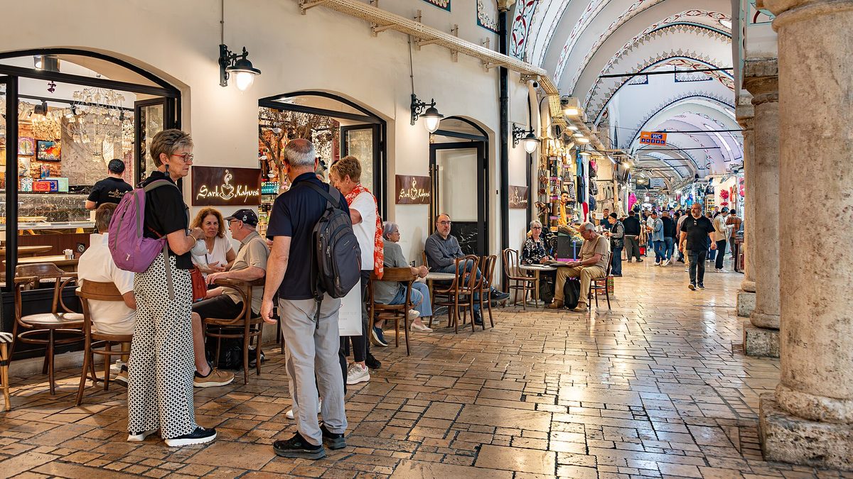 Shoppers in a vaulted arcade of the Grand Bazaar in Istanbul