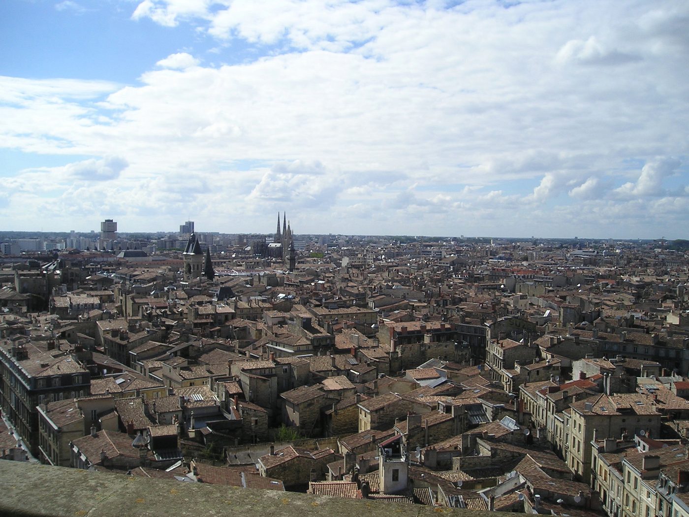 The tiled rooftops and spires of central Bordeaux seen from the Tour Pey-Berland