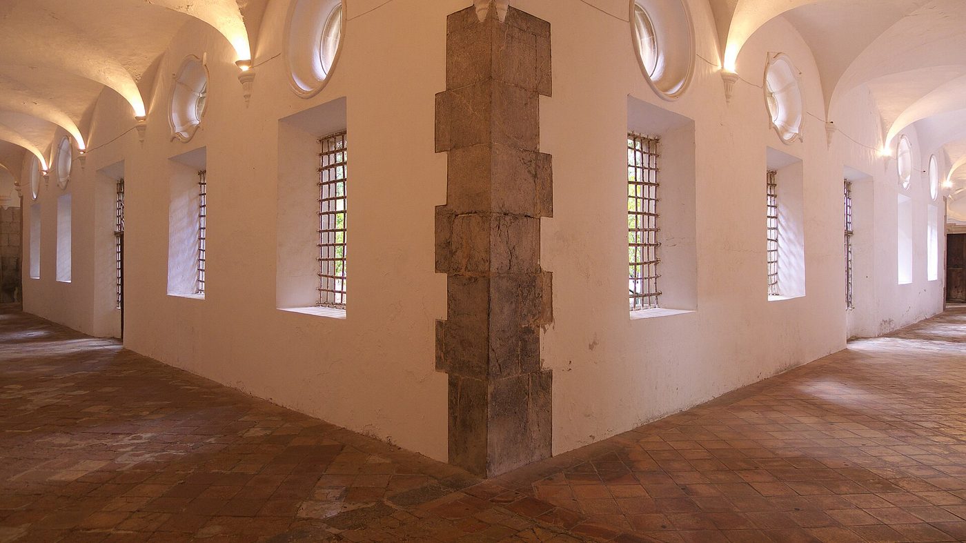 A vaulted cloister corridor inside the Royal Charterhouse of Valldemossa, Mallorca