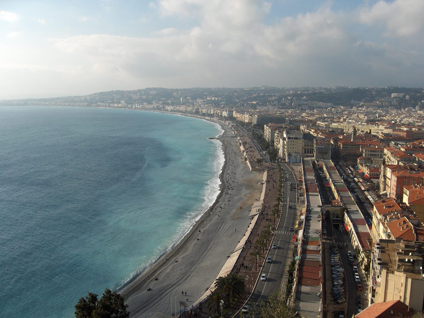 The Promenade des Anglais and the pebble shore of the Baie des Anges at Nice