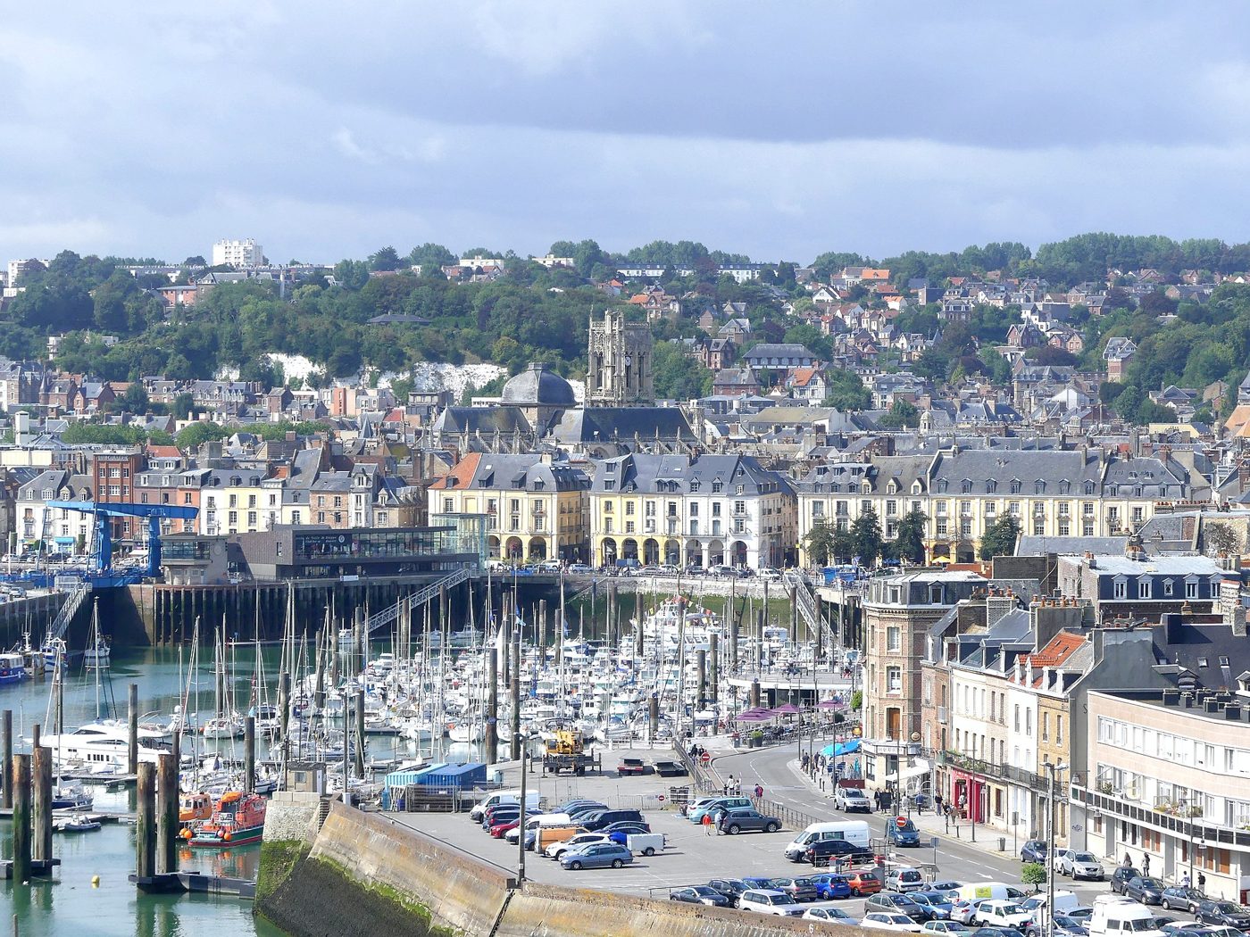 Yachts in the harbour at Dieppe below the town and the chalk cliffs