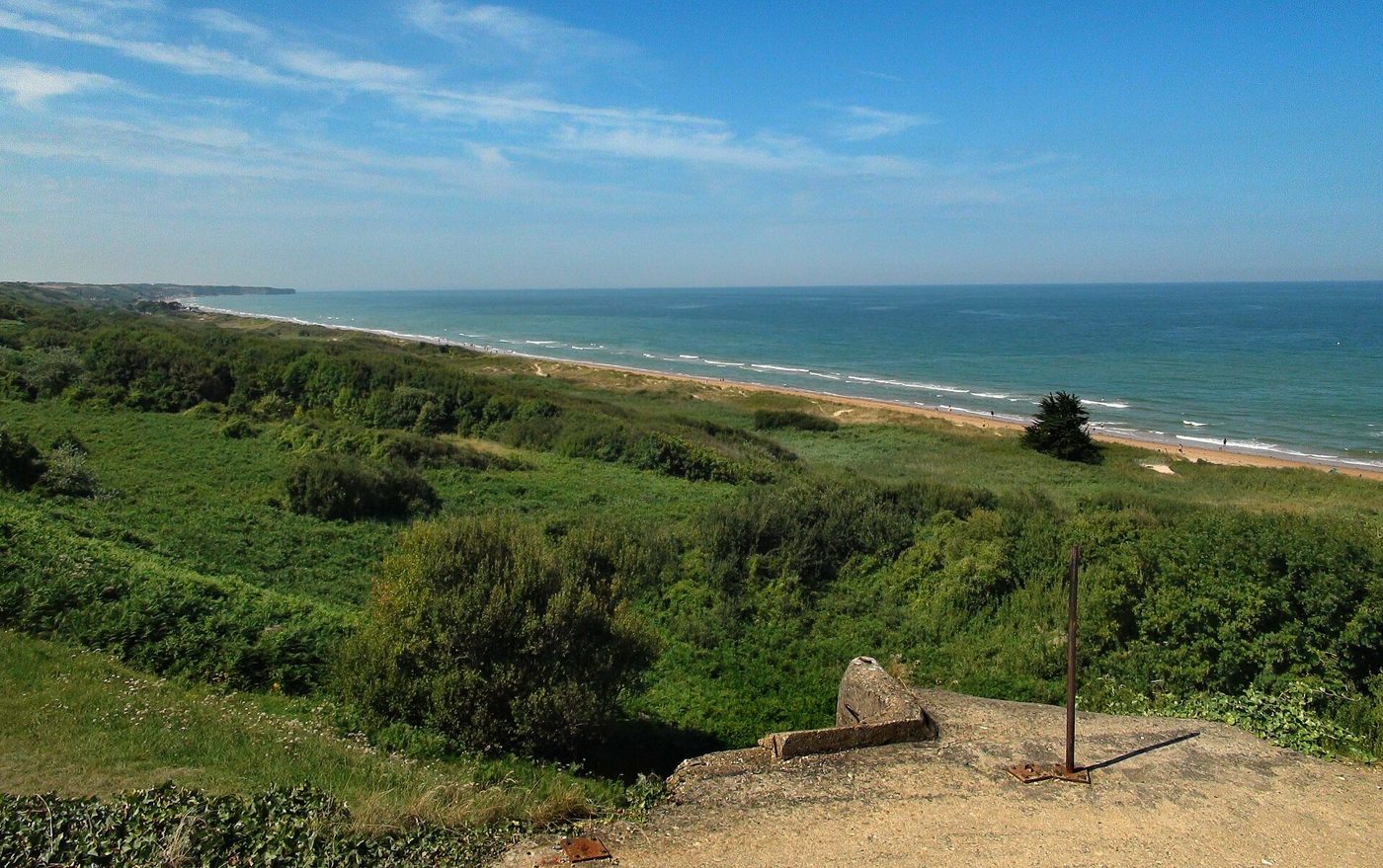 The long sand of Omaha Beach seen from the bluffs above Colleville-sur-Mer