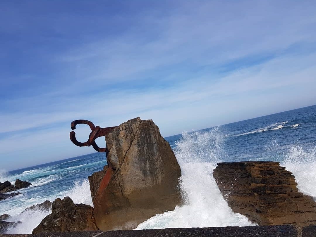 Eduardo Chillida's Peine del Viento sculpture set into the rocks at the end of Ondarreta beach