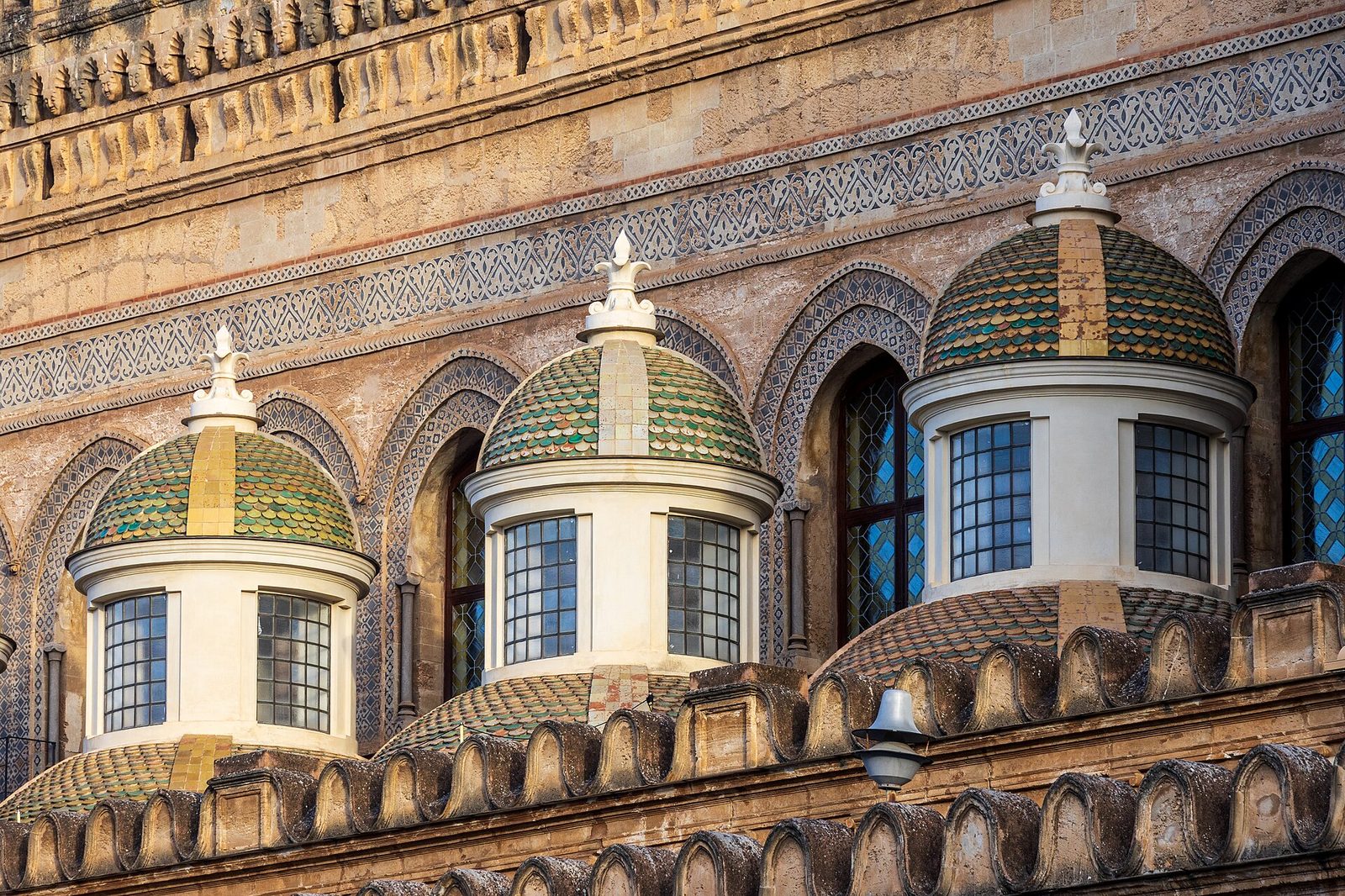Majolica-tiled domes and Arab-Norman detailing on Palermo Cathedral in Sicily