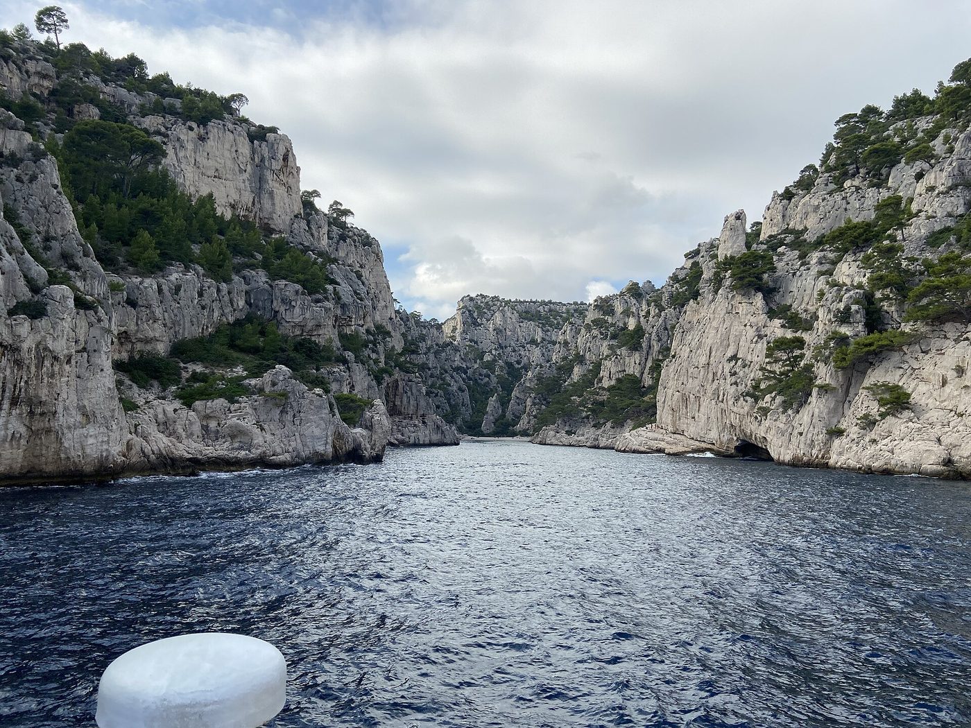 Turquoise water between white limestone cliffs at Calanque d'En-Vau near Cassis