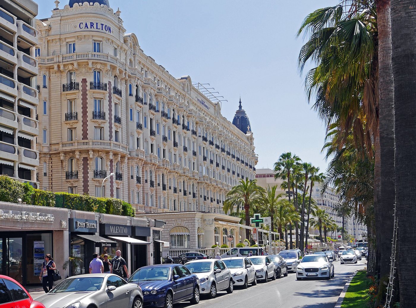 The palm-lined Boulevard de la Croisette and beachfront at Cannes