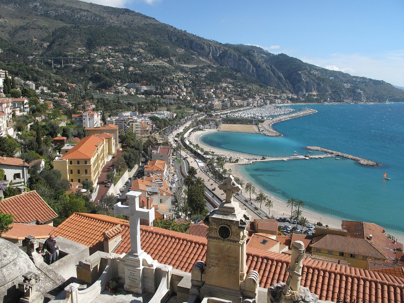 The pastel old town of Menton above its harbour near the Italian border
