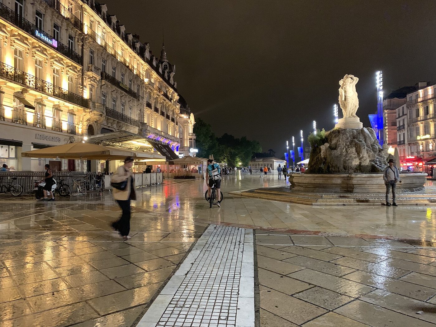 The Three Graces fountain and the opera house on Place de la Comedie in Montpellier at night