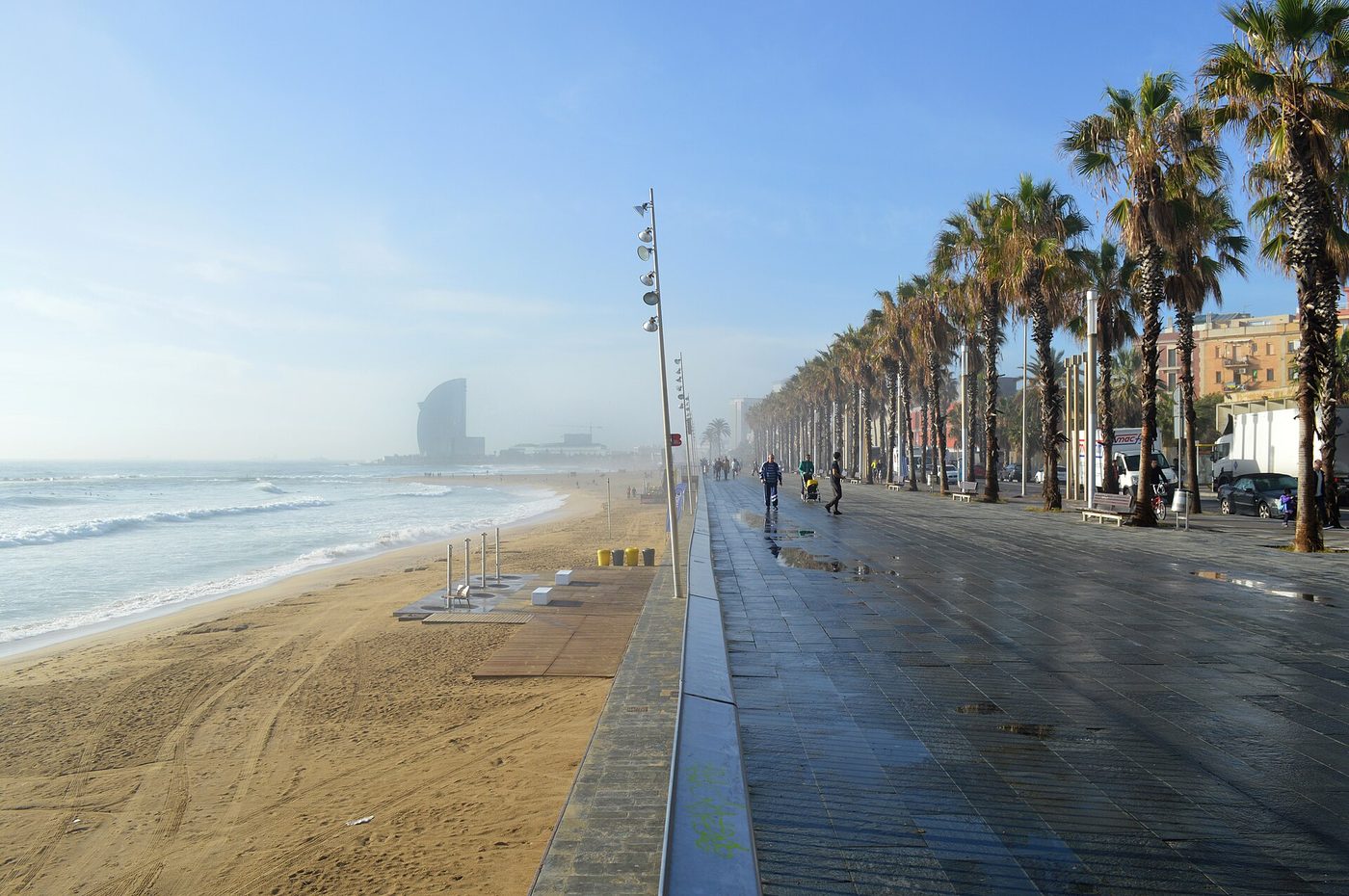The promenade and sand at Barceloneta beach with the W hotel beyond, Barcelona