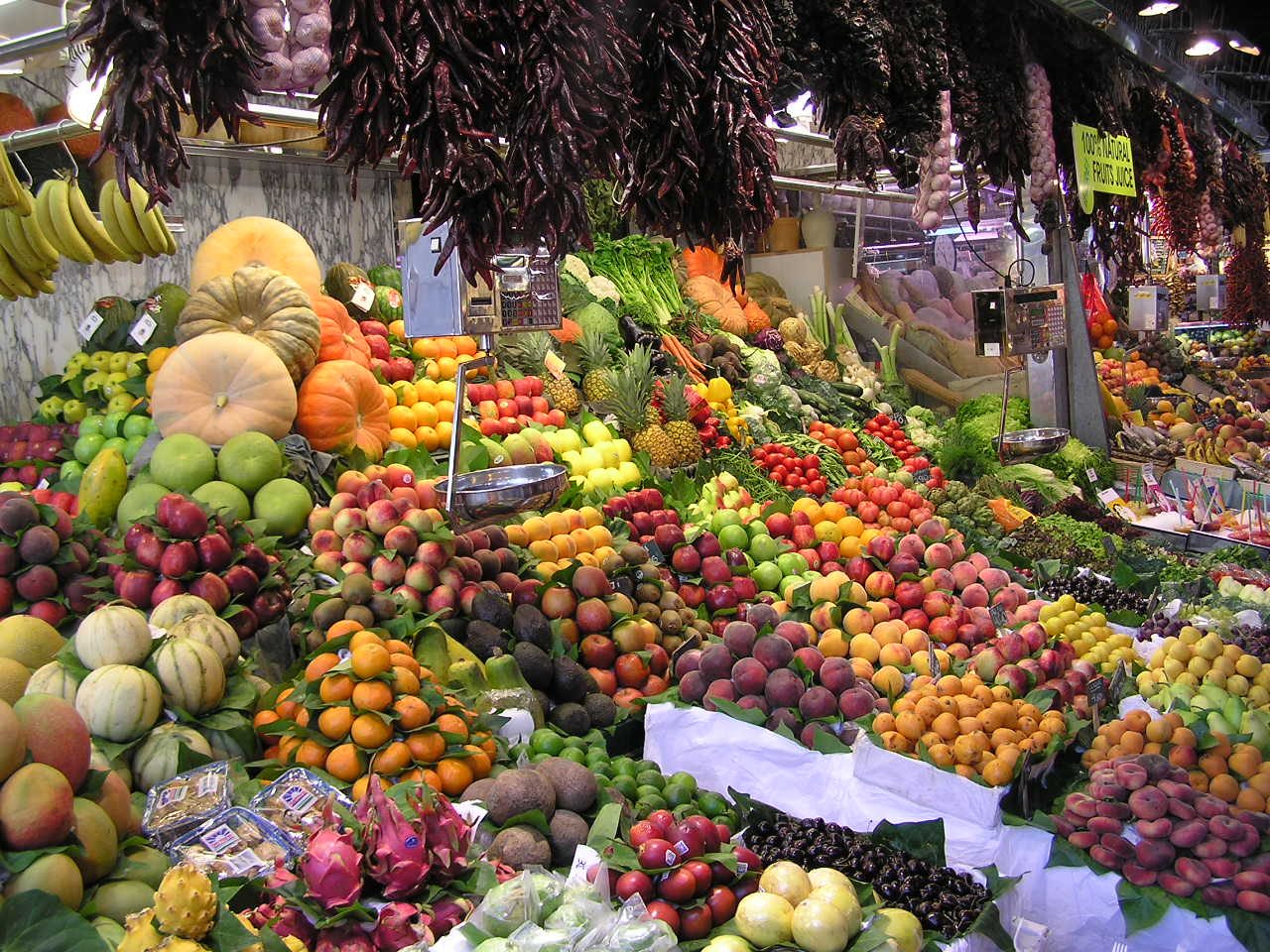 Produce stalls inside the Mercat de la Boqueria in Barcelona