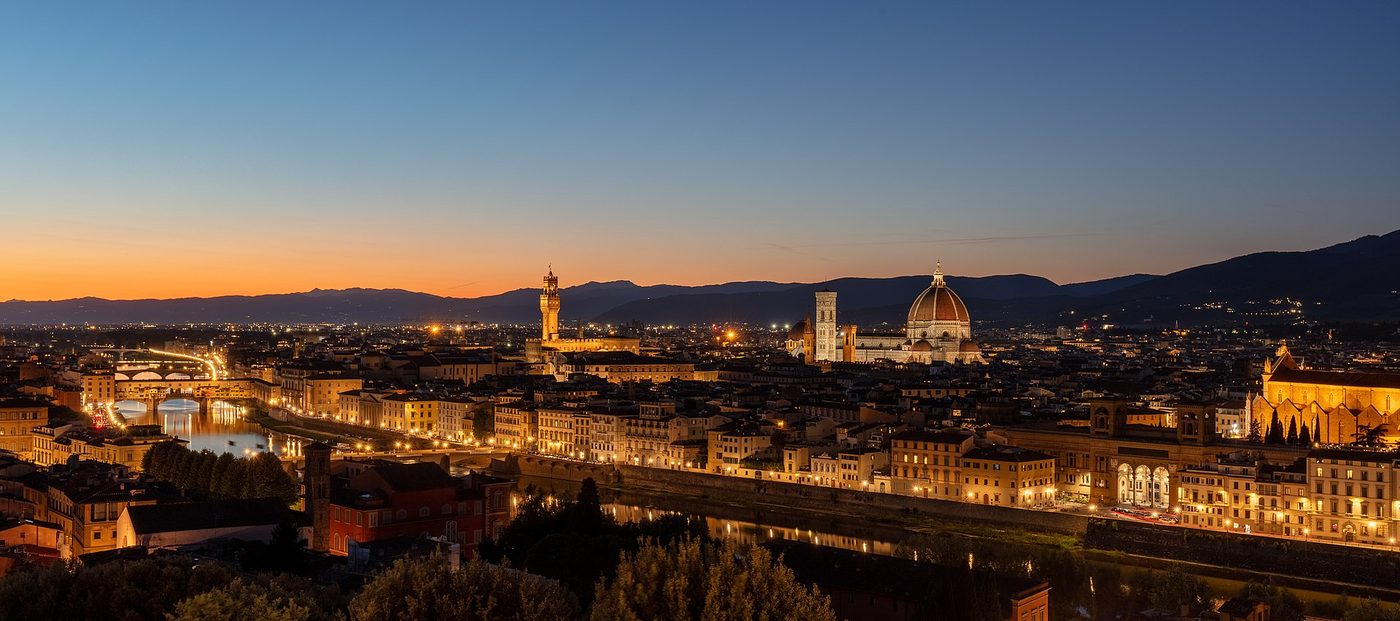 Florence at dusk from Piazzale Michelangelo, with the Arno, Palazzo Vecchio and the cathedral dome lit up