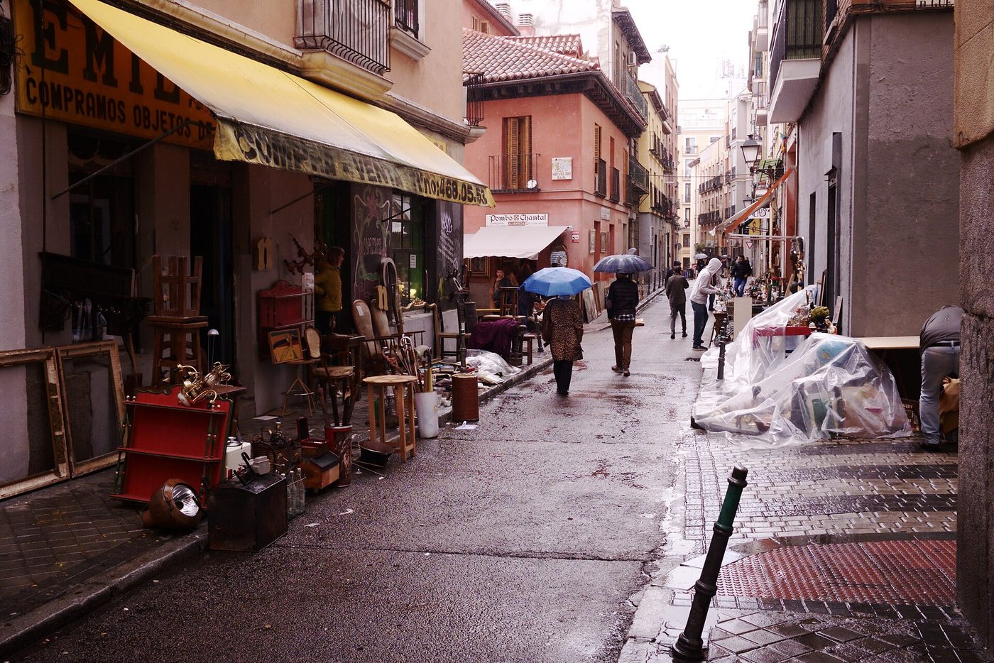 Stalls and second-hand furniture at the El Rastro flea market in La Latina, Madrid