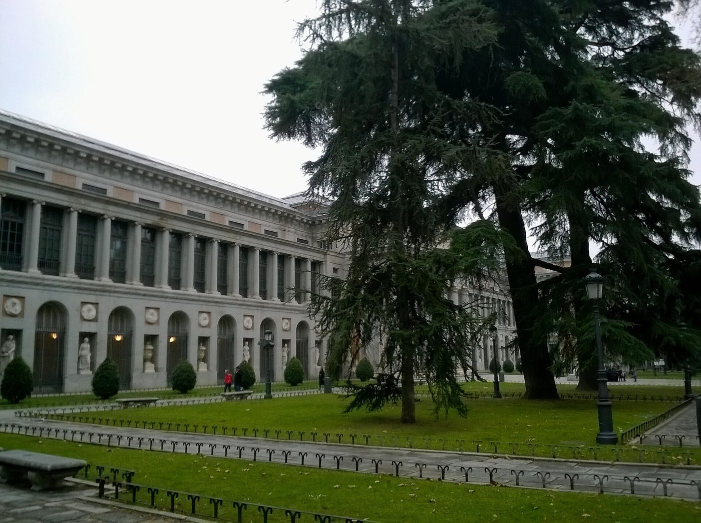 The colonnaded west facade of the Museo del Prado on the Paseo del Prado in Madrid