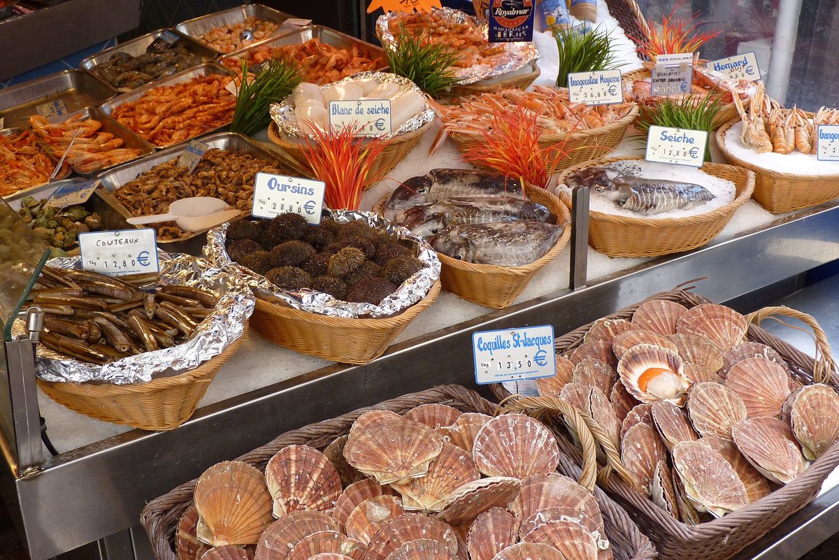 A fishmonger's display of shellfish and prawns on Rue Mouffetard in the Latin Quarter of Paris