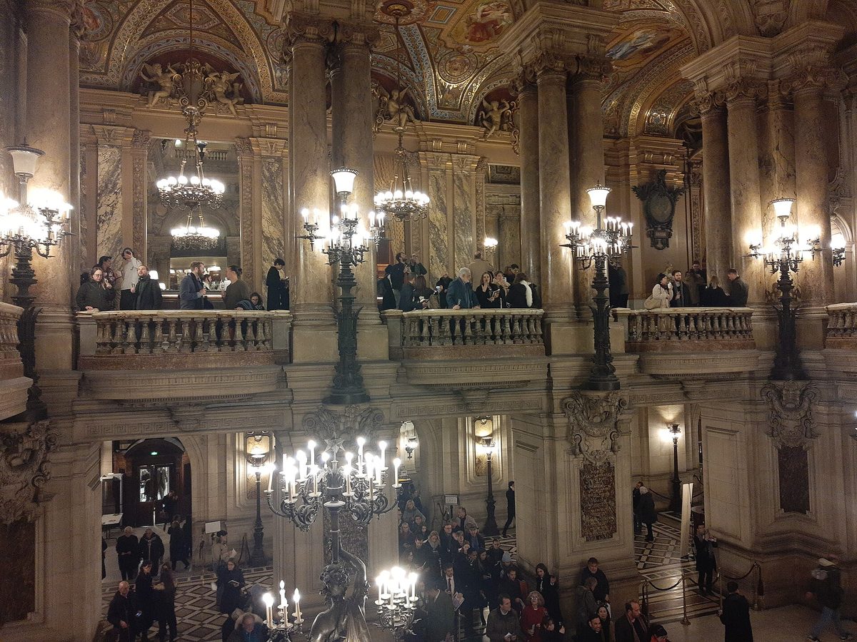 Chandeliers and marble balconies in the grand foyer of the Palais Garnier opera house in Paris