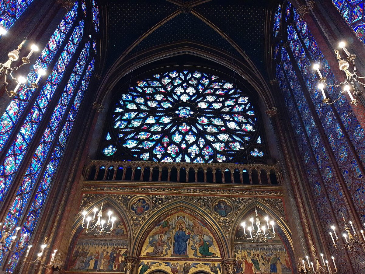 The rose window and stained glass of the upper chapel at Sainte-Chapelle in Paris