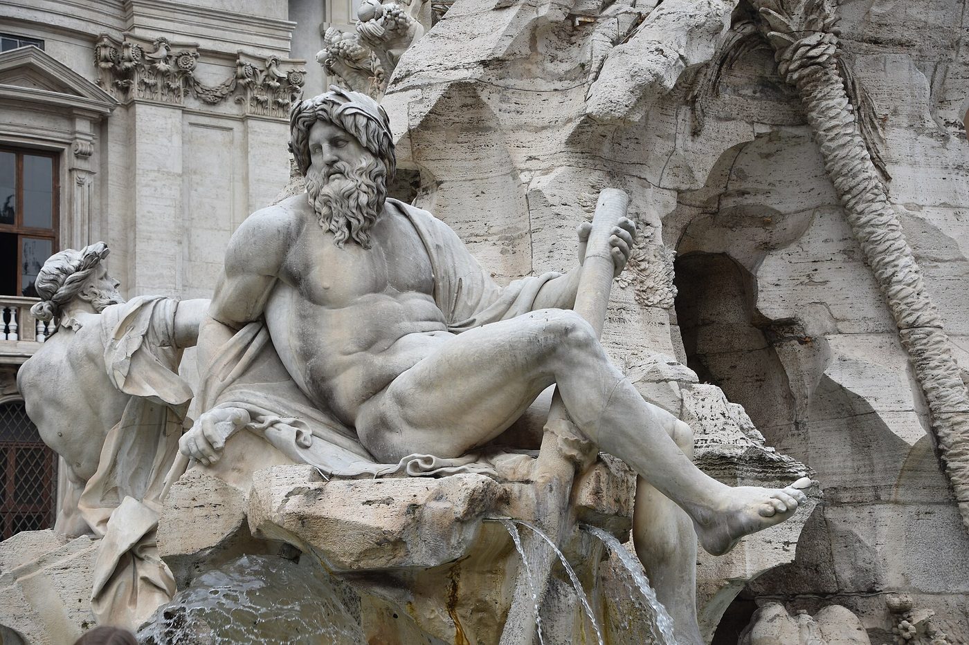 A river god on Bernini's Fountain of the Four Rivers in Piazza Navona, Rome