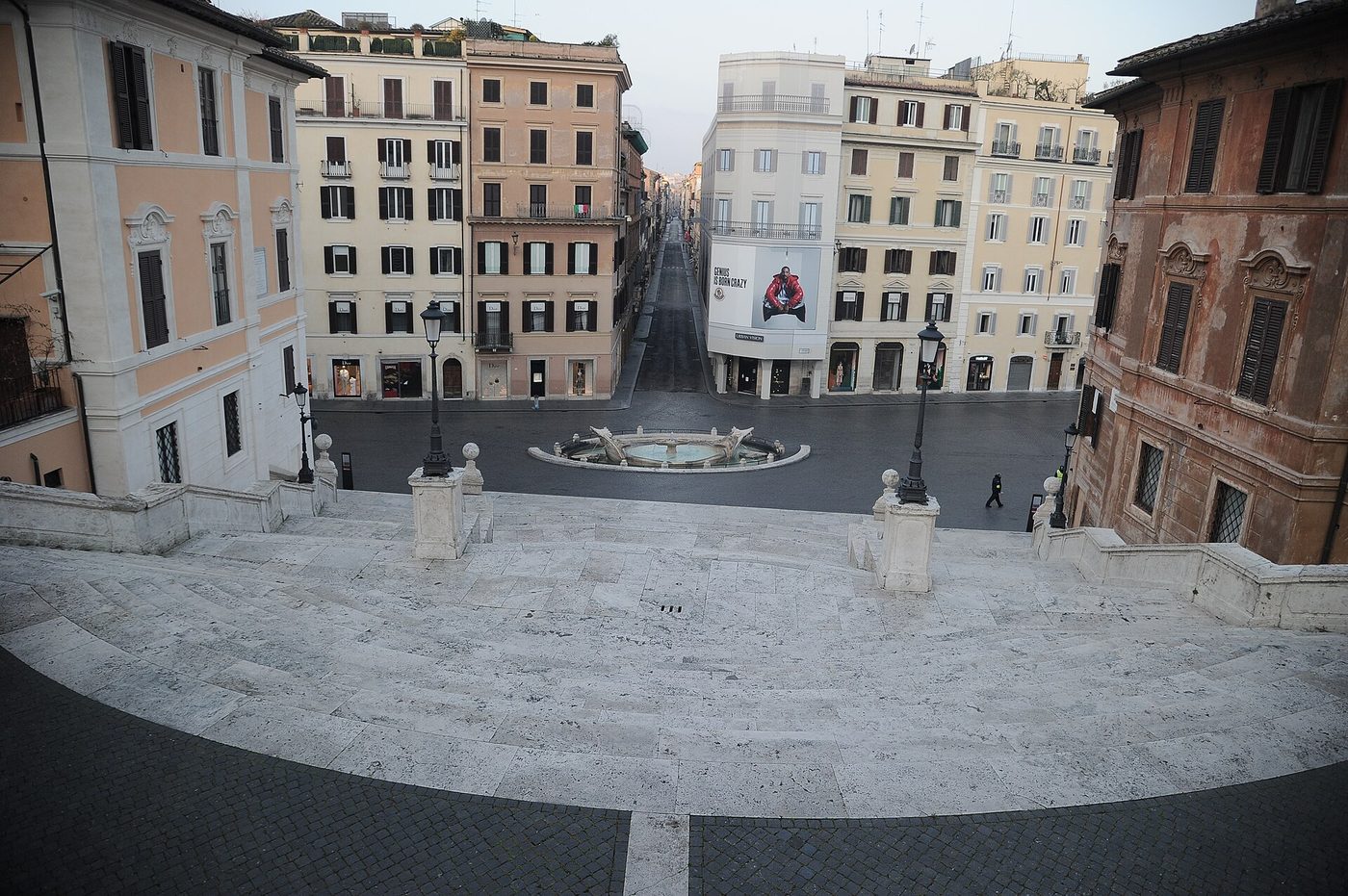 The Spanish Steps in Rome, empty at first light, looking down to Via dei Condotti