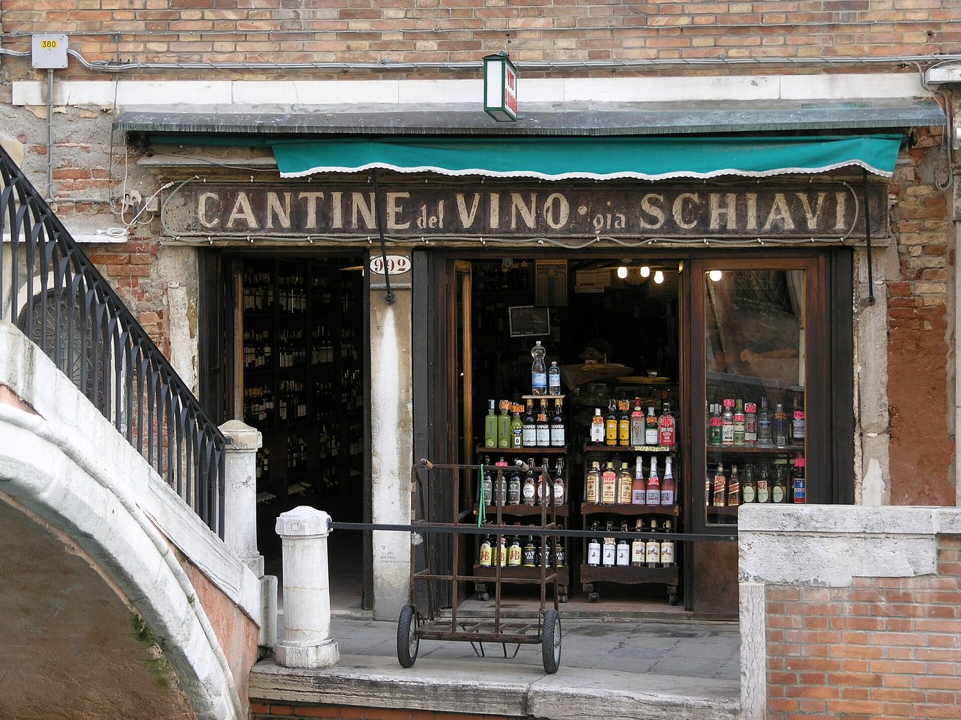 The wooden shopfront of Cantine del Vino gia Schiavi, a historic bacaro serving cicchetti in Dorsoduro, Venice