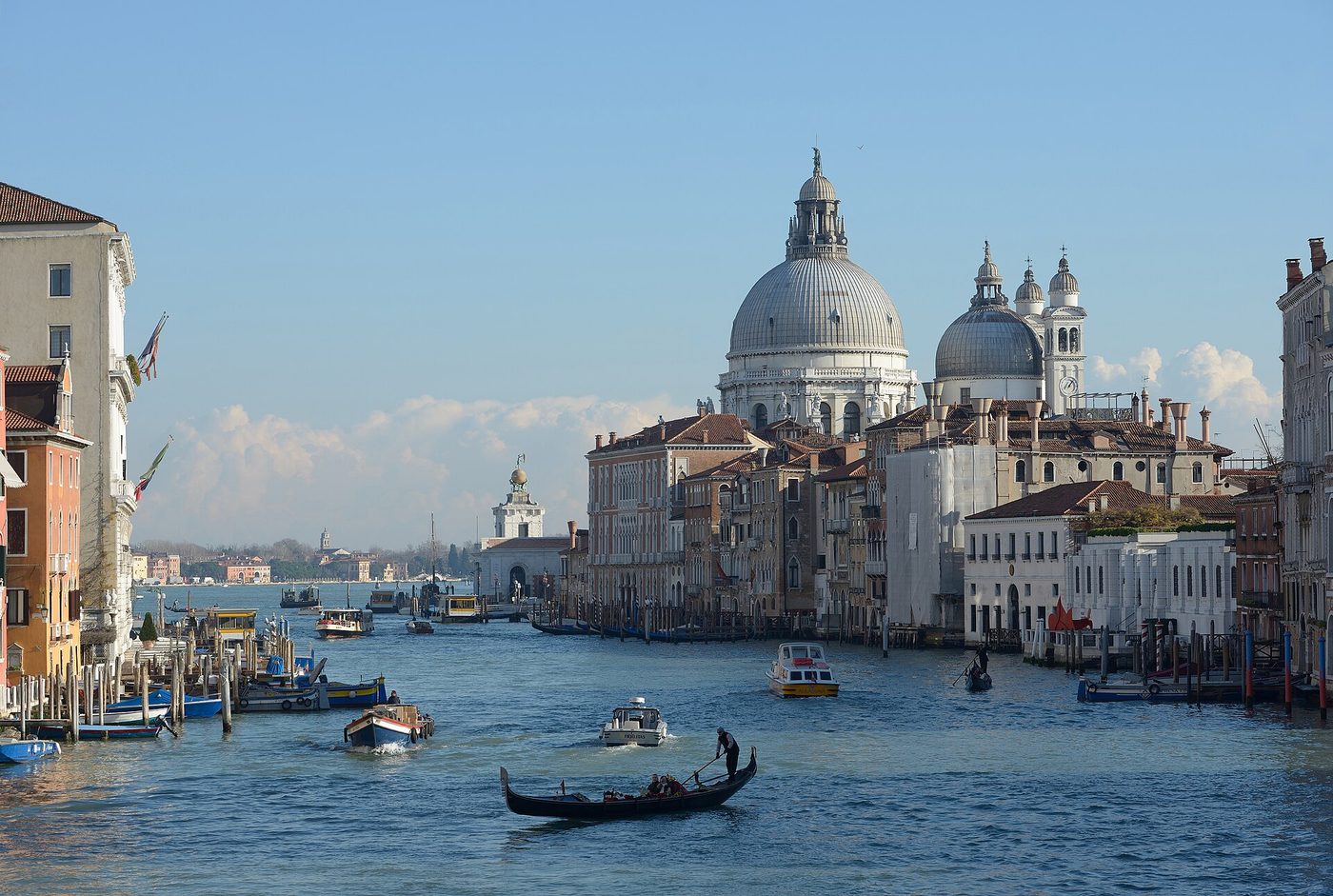 A gondola on the Grand Canal in Venice with the dome of Santa Maria della Salute behind