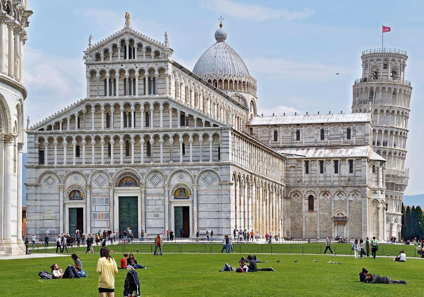 The cathedral and Leaning Tower on the lawn of the Piazza dei Miracoli in Pisa